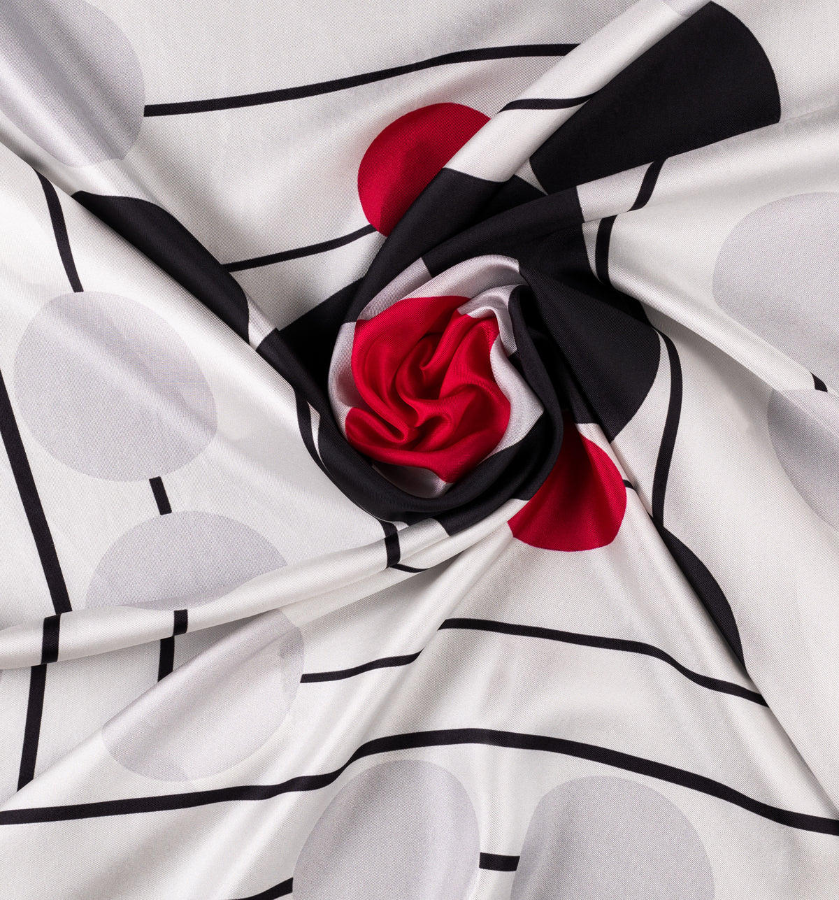 DWAEP Polka and Pop silk twill scarf shown in a draped close-up
