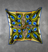 DWAEP Dancing Peacock silk scarf shown folded
